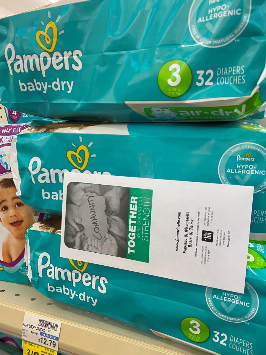 Money on a pack of diapers