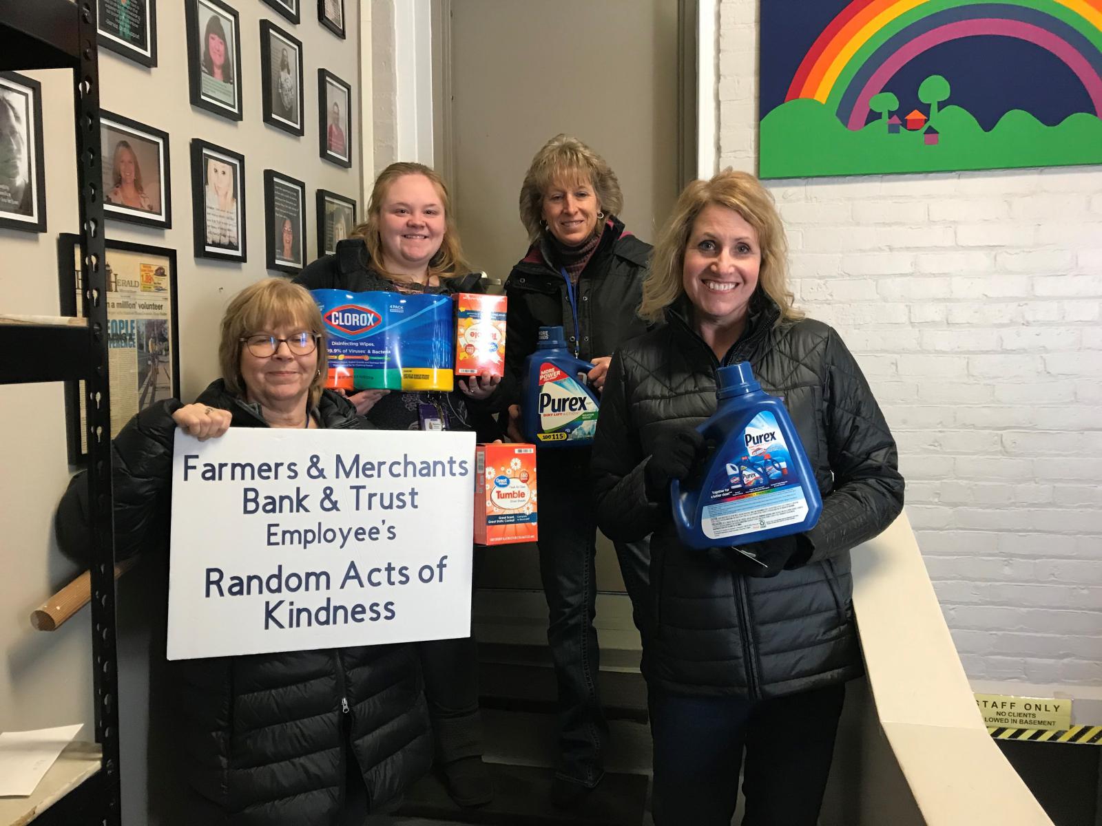 FMBT employees delivering cleaning supplies to the Rainbow House