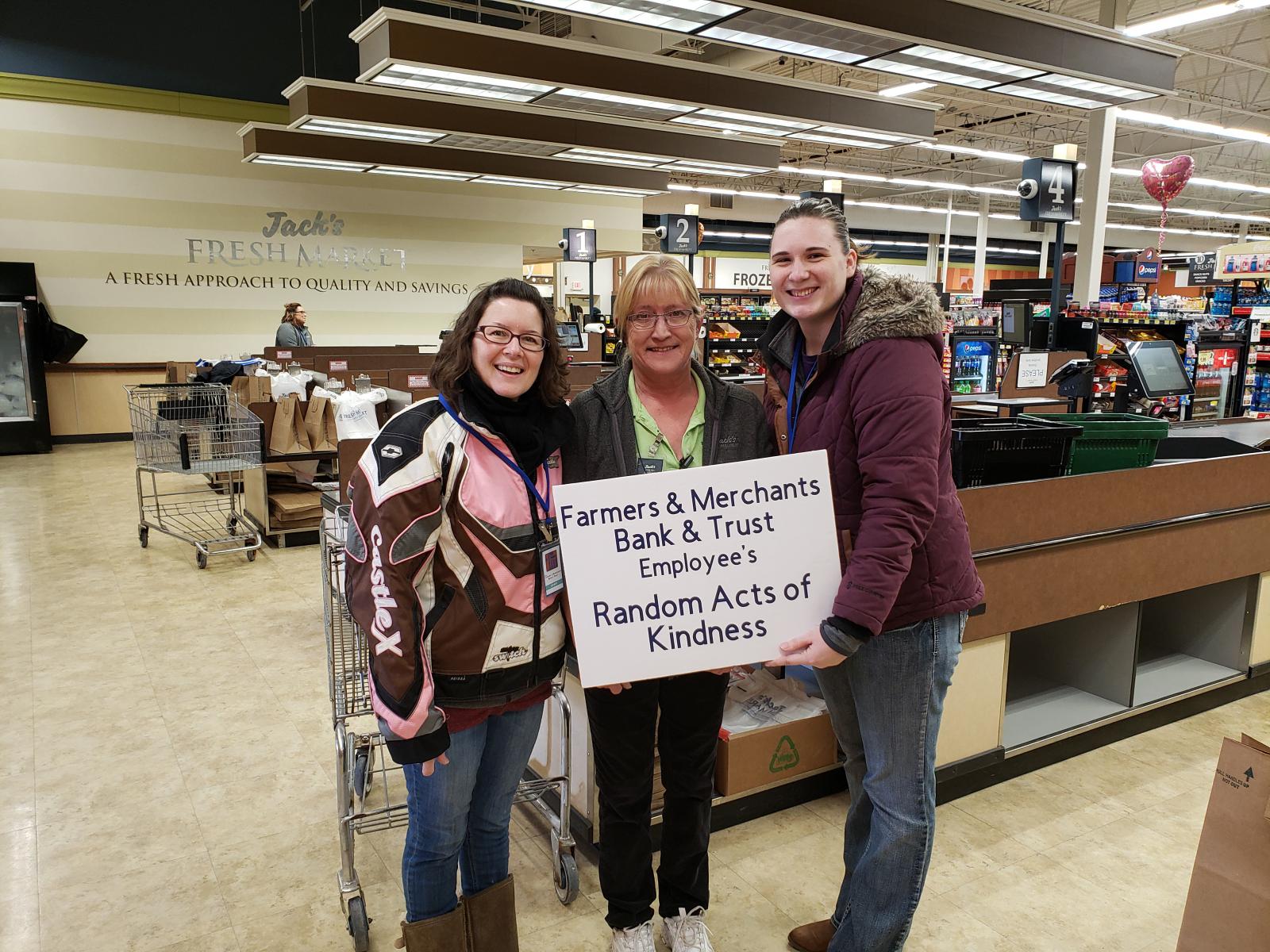 FMBT employees packing bags at Jack's Fresh Market