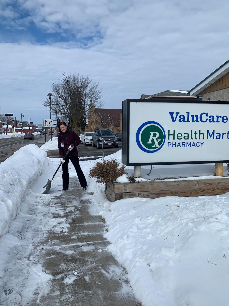 FMBT employee shoveling snow